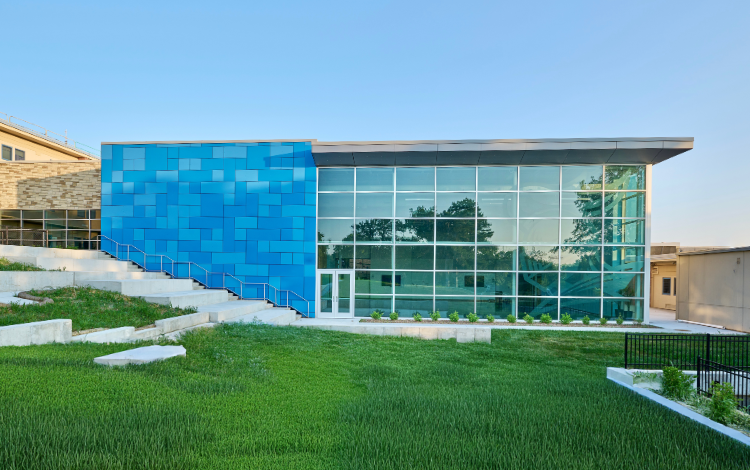 glass building with blue exterior details